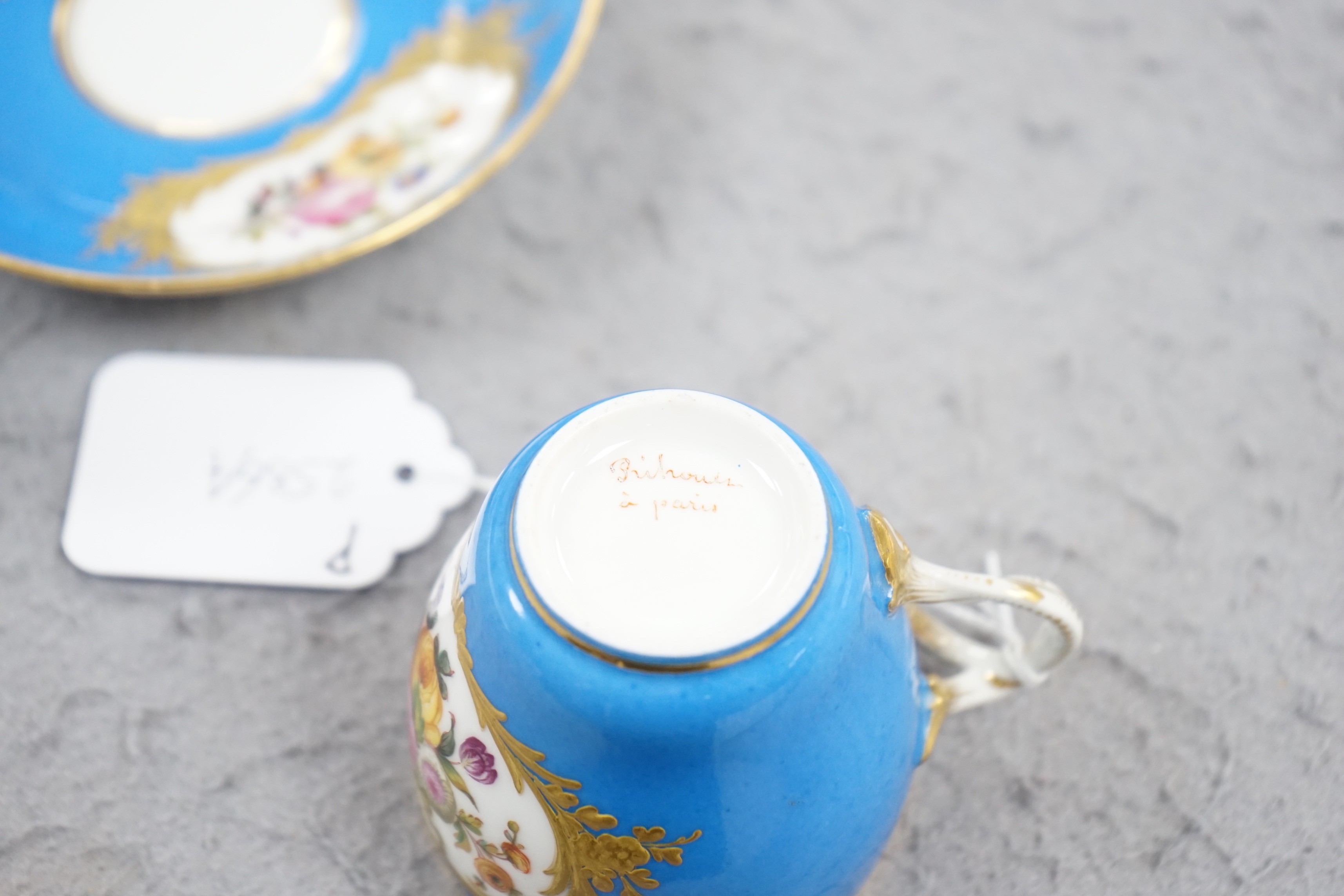 A Paris porcelain Sevres style cup and saucer